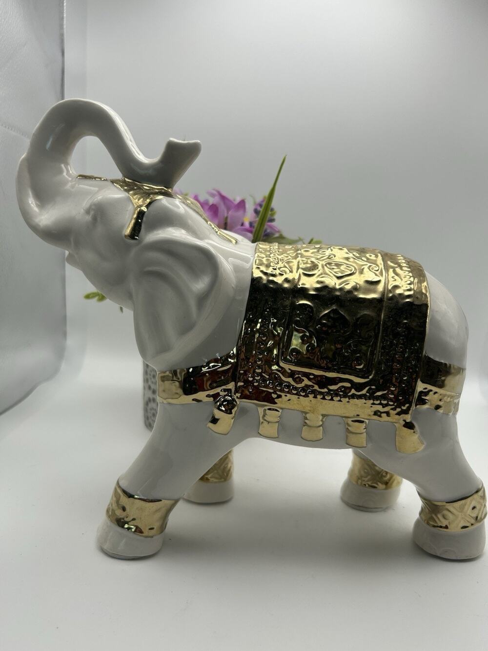 White Elephant. Gold Accents. Trunk Up